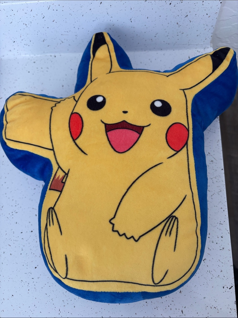 Northwest Yellow and Blue Pikachu Plush Pillow 
It has a tiny little hole.